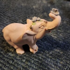 vintage Walker Renaker pink bisque elephant figurine with a trunk up